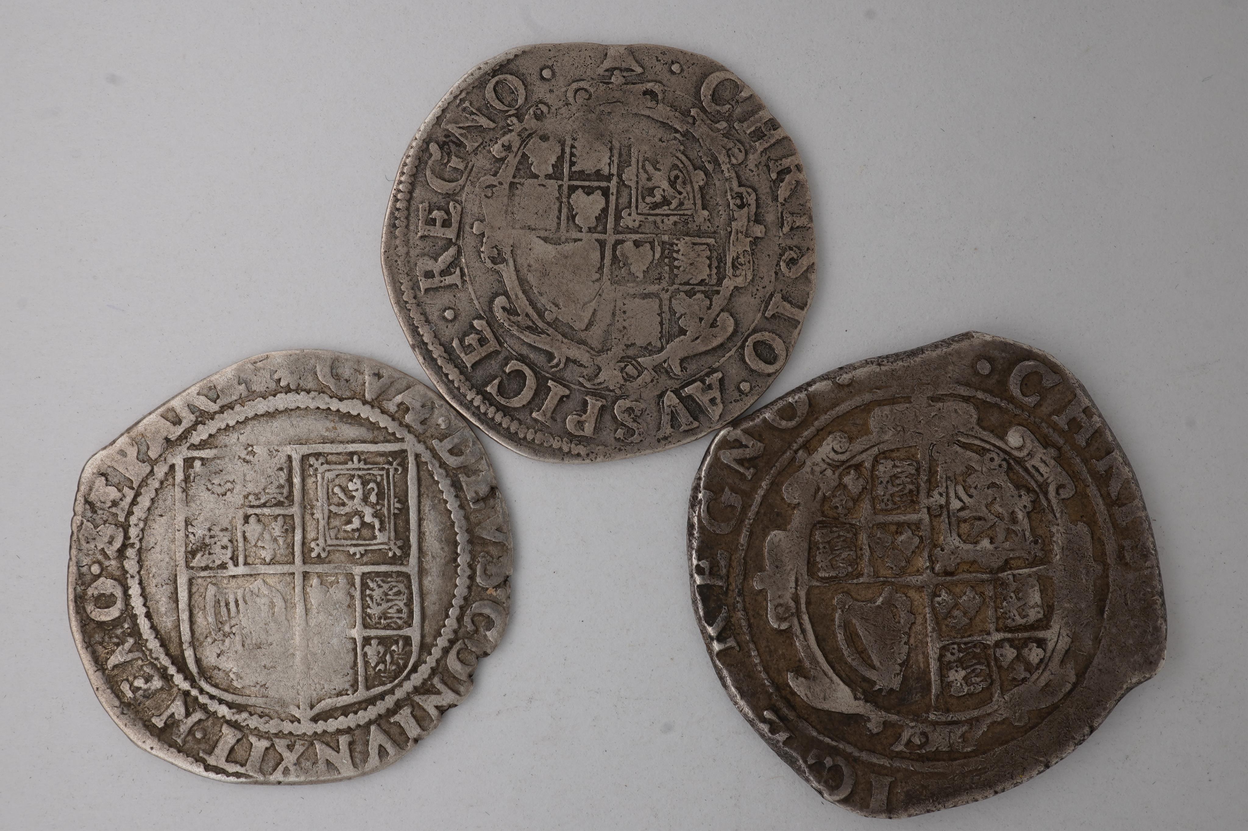 Three British hammered silver coins, House of Stuart, Charles I (1625-1649), silver halfcrown, S. 2779, irregular flan, fine, and, silver shilling, mm. bell, fine, James I (1603-1625), silver shilling, Middleham hoard, S